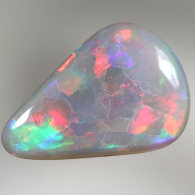 SOLID SEMI BLACK OPAL Bright fire. RARE Jigsaw pattern